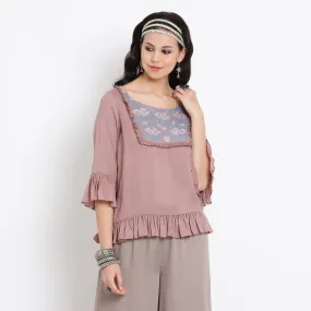 Pink viscose frill top with floral thread embroidery at yoke Pink viscose frill top with floral thread embroidery at yoke