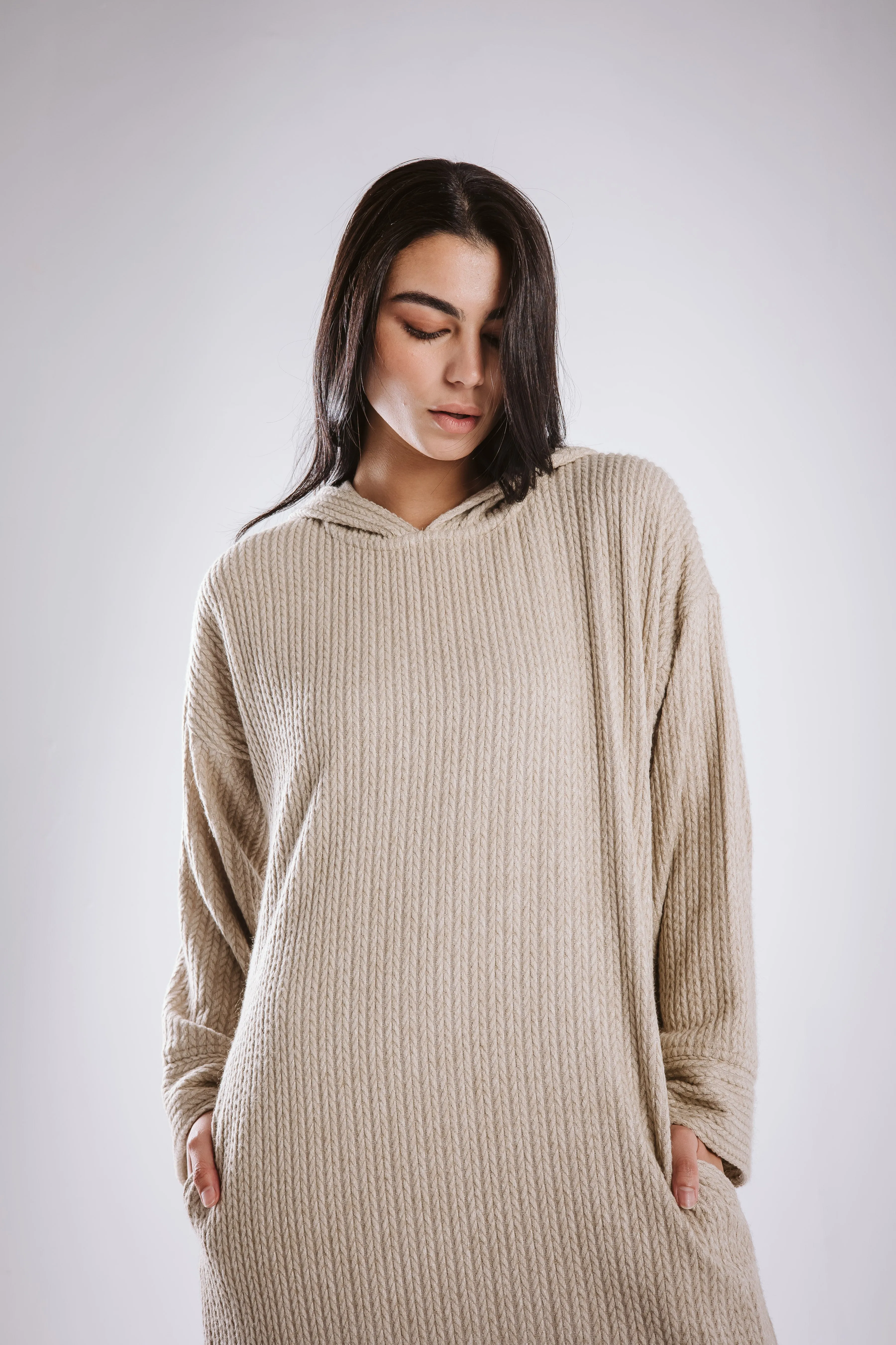 The knitted hoodie dress